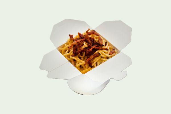 Carbonara - Classic Roman pasta with eggs, cheese, and pancetta